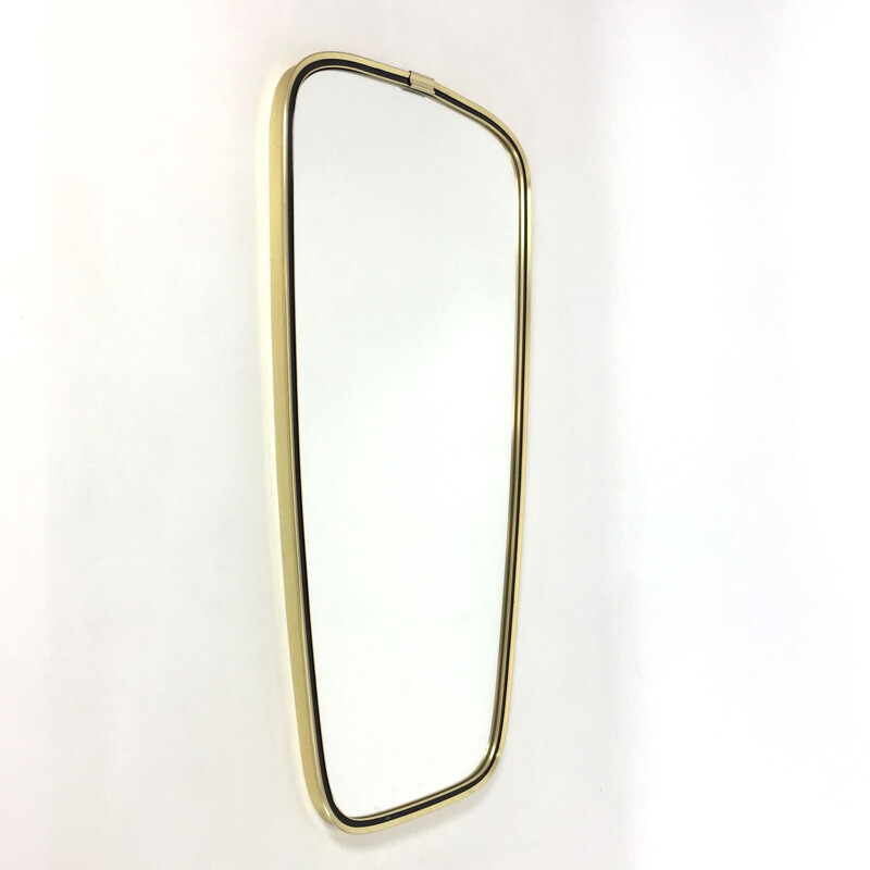 Modern free-shaped mirror with golden metal frame- 1960s
