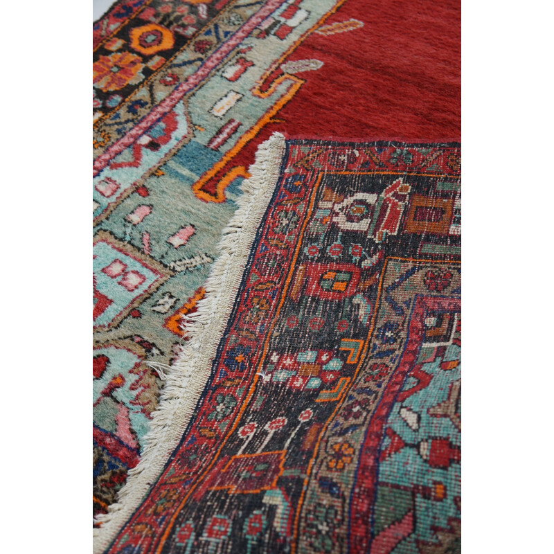 Vintage colorful hand-knotted Persian rug