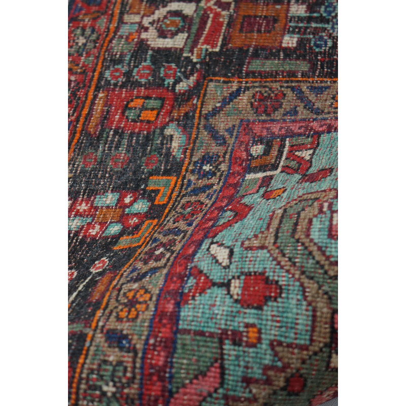 Vintage colorful hand-knotted Persian rug