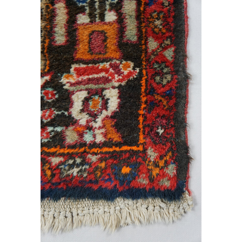 Vintage colorful hand-knotted Persian rug