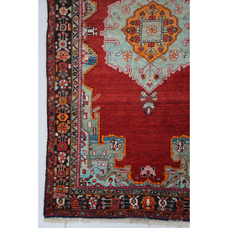 Vintage colorful hand-knotted Persian rug