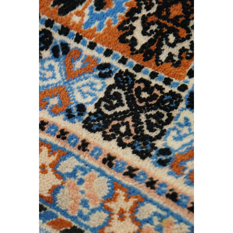 Vintage light blue oriental rug