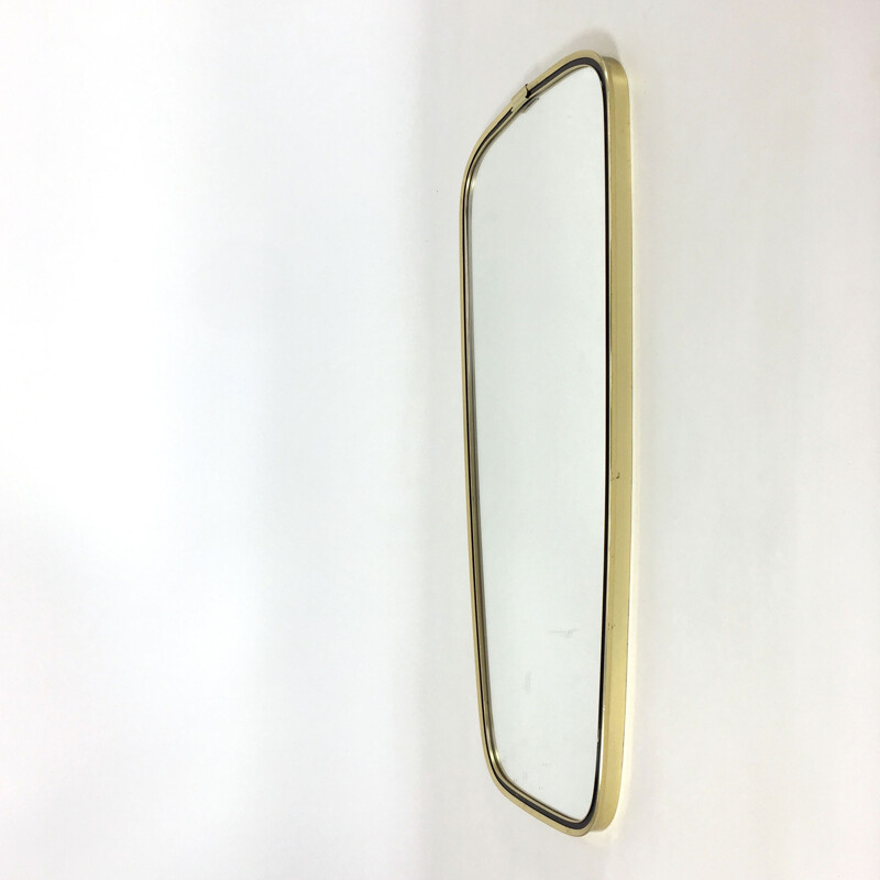 Modern free-shaped mirror with golden metal frame- 1960s