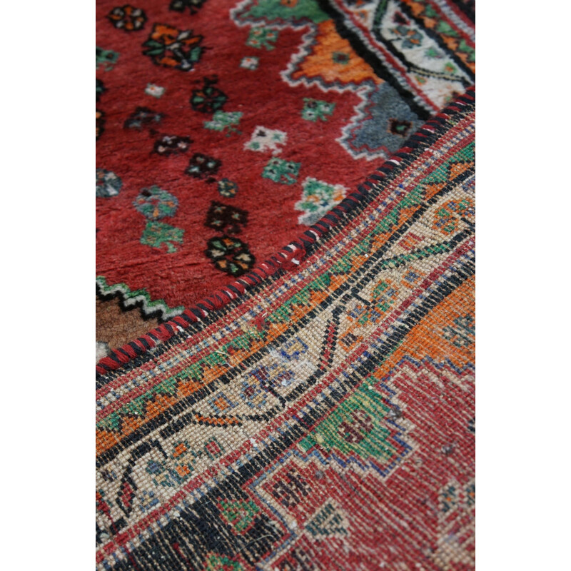 Vintage colorful hand-knotted Shiras rug