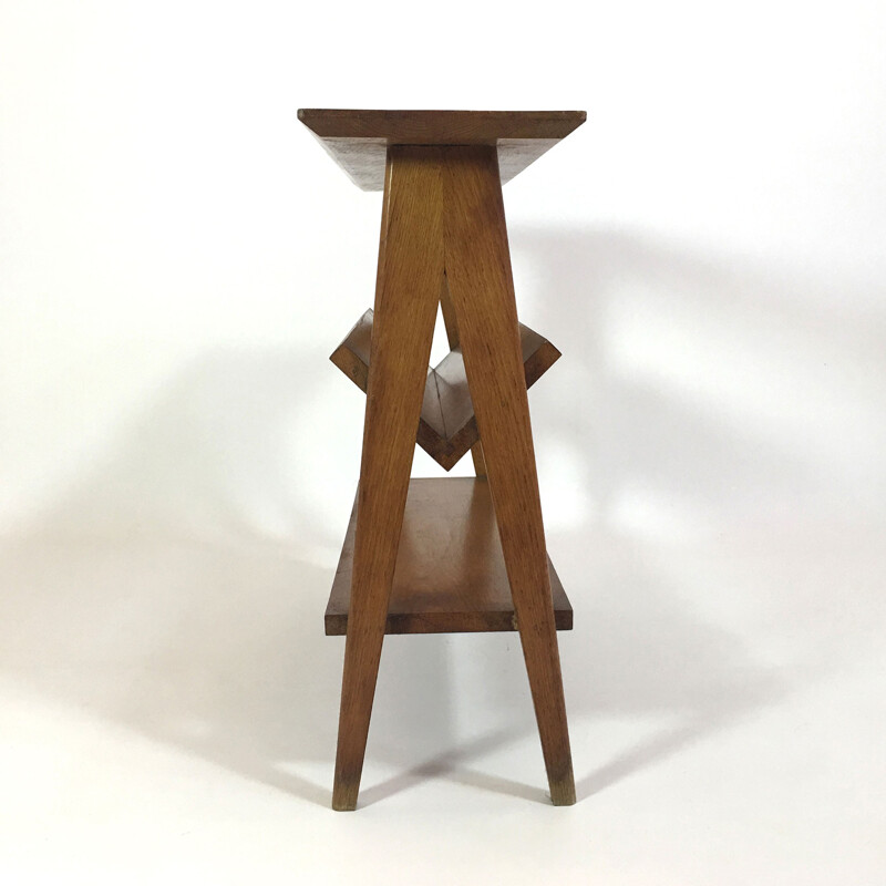 Oak side table with a magazine rack and a shelf - 1950s