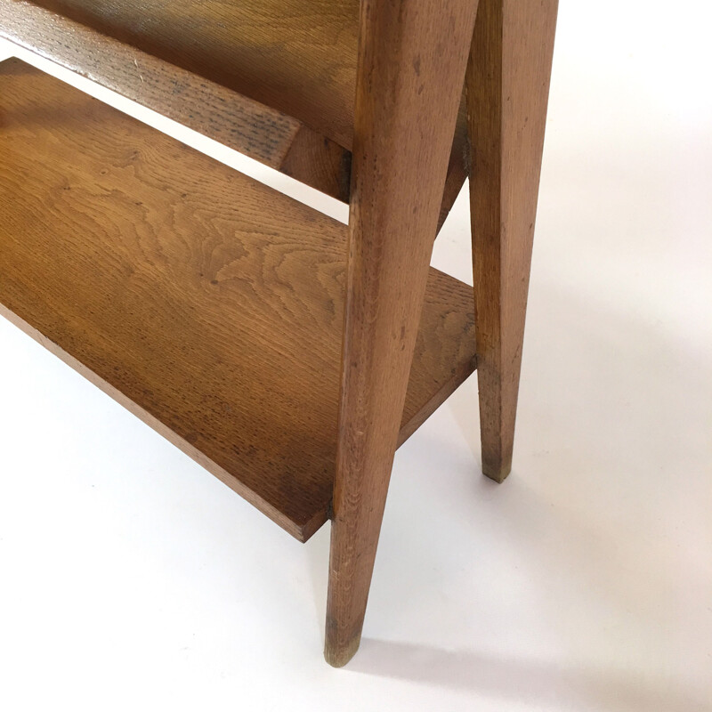 Oak side table with a magazine rack and a shelf - 1950s