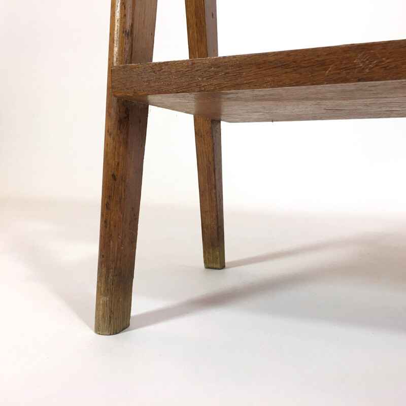 Oak side table with a magazine rack and a shelf - 1950s