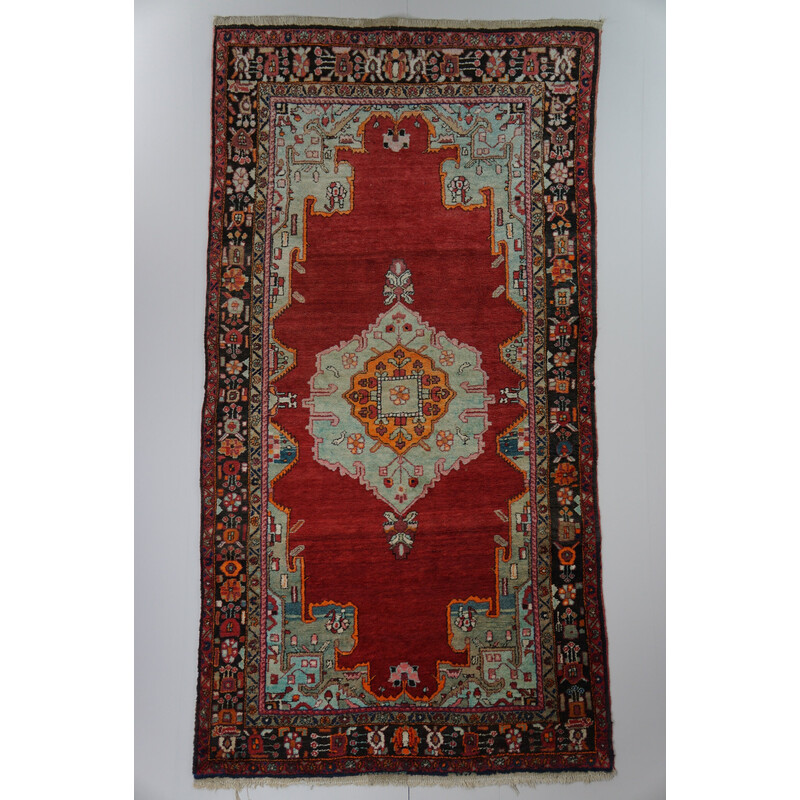 Vintage colorful hand-knotted Persian rug