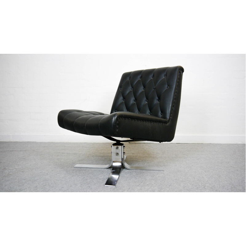 Low swivel chair in black leatherette - 1970s