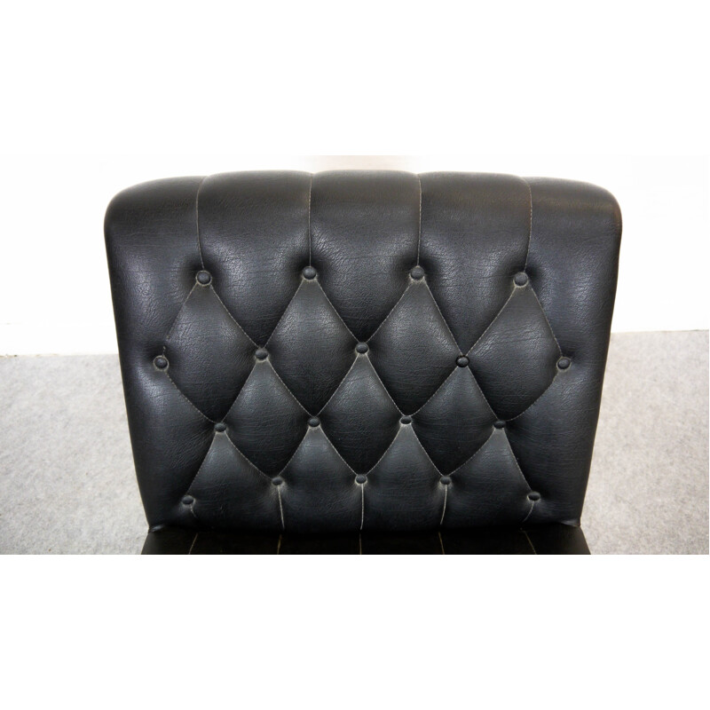 Low swivel chair in black leatherette - 1970s
