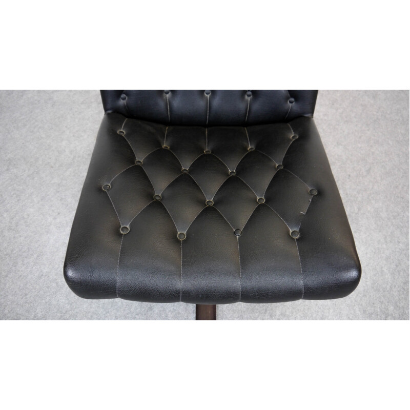 Low swivel chair in black leatherette - 1970s