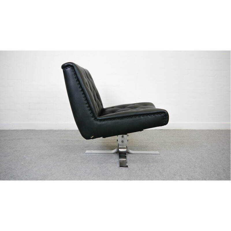 Low swivel chair in black leatherette - 1970s