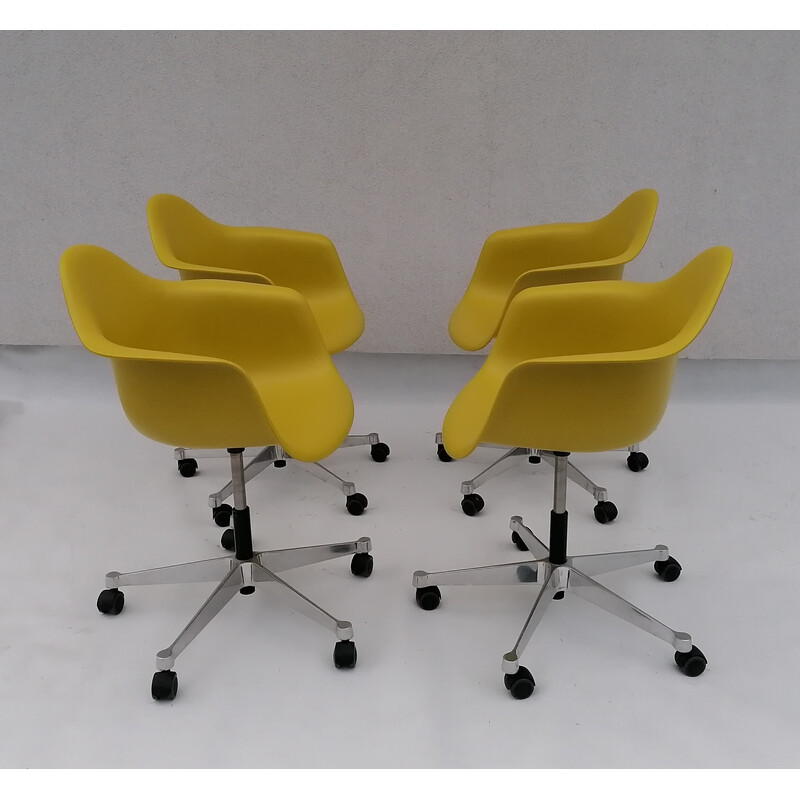 Set of 4 vintage Pacc lime plastic chairs by Charles and Ray Eames for Vitra, 2000