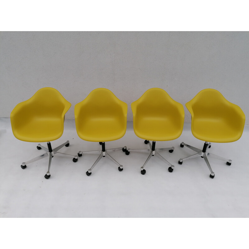 Set of 4 vintage Pacc lime plastic chairs by Charles and Ray Eames for Vitra, 2000