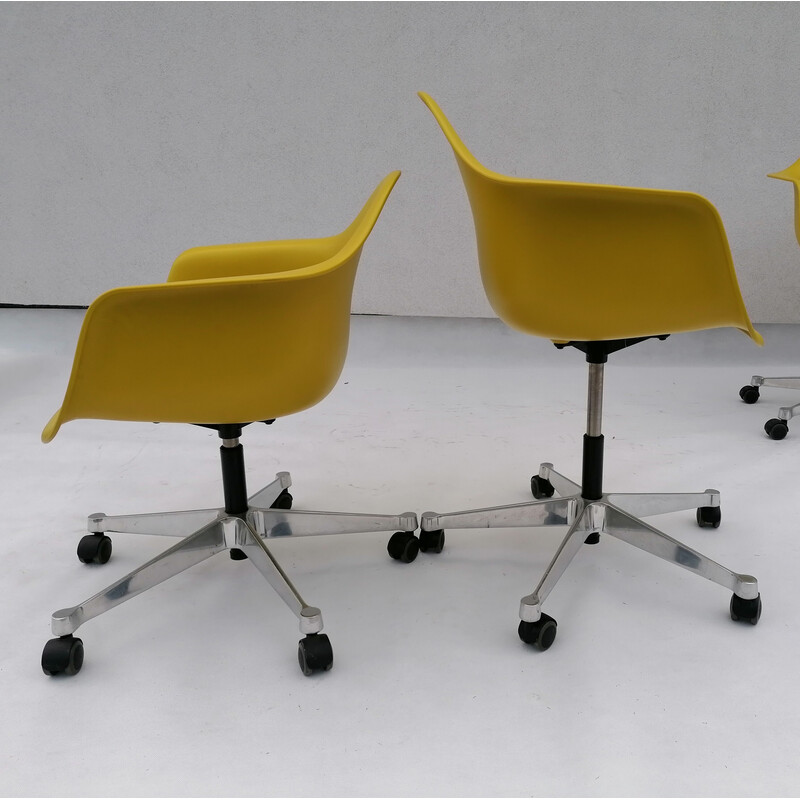 Set of 4 vintage Pacc lime plastic chairs by Charles and Ray Eames for Vitra, 2000