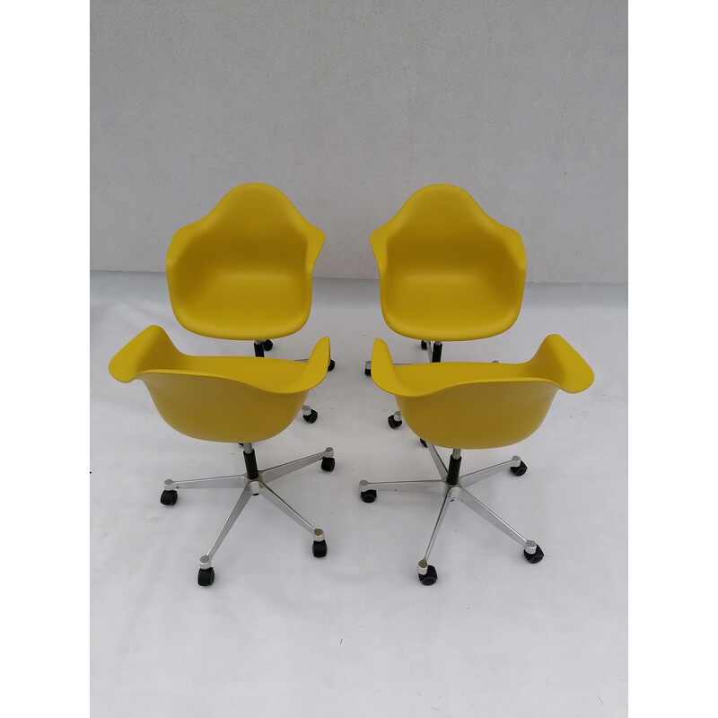 Set of 4 vintage Pacc lime plastic chairs by Charles and Ray Eames for Vitra, 2000