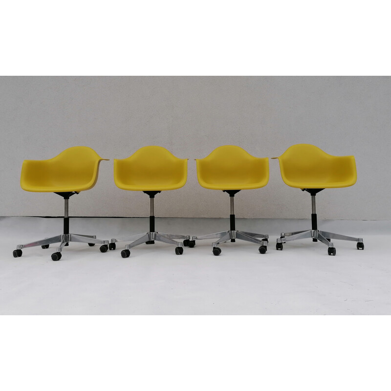 Set of 4 vintage Pacc lime plastic chairs by Charles and Ray Eames for Vitra, 2000