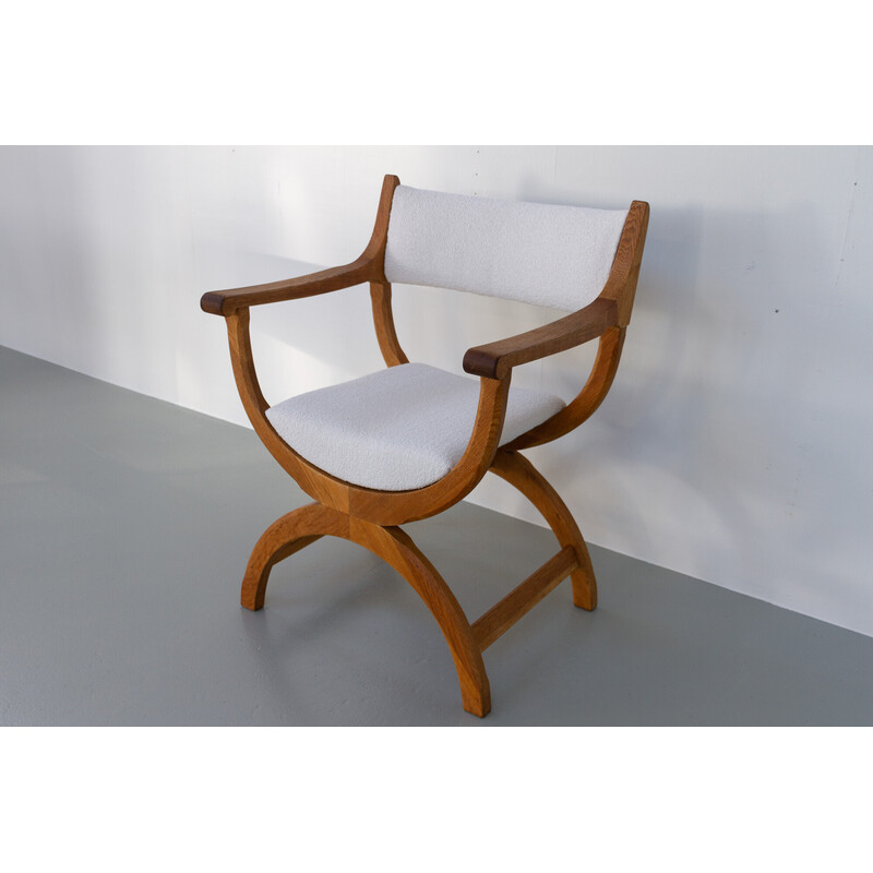 Vintage Danish Kurul armchair in oakwood and bouclé by Henning Kjærnulf, 1960s