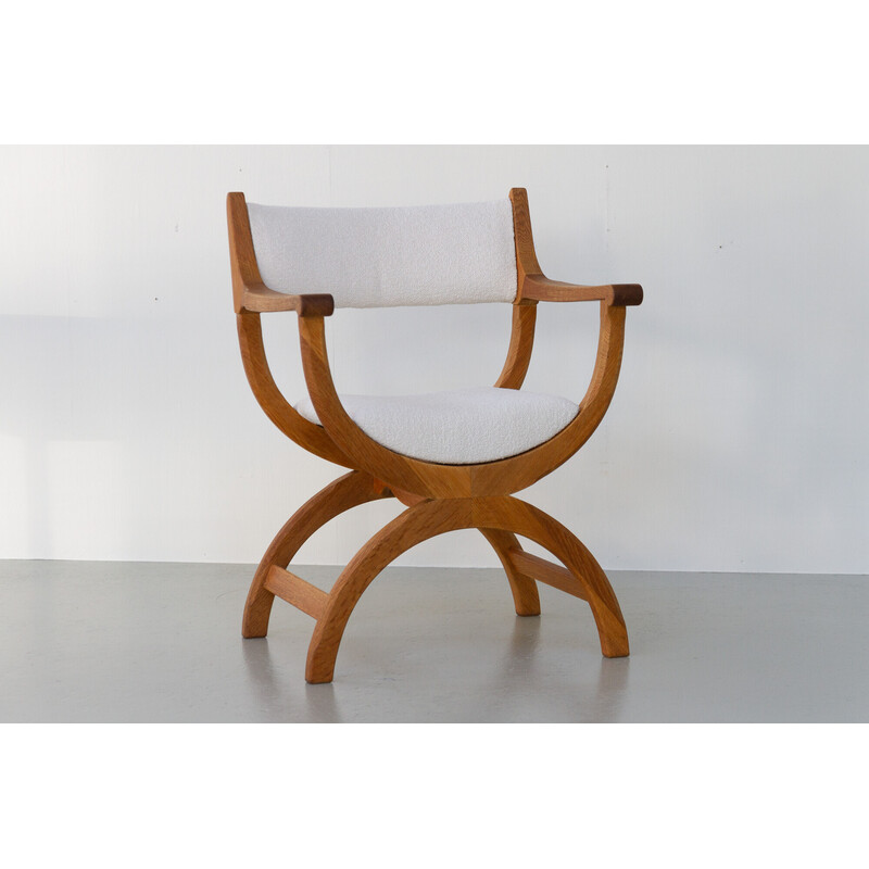 Vintage Danish Kurul armchair in oakwood and bouclé by Henning Kjærnulf, 1960s