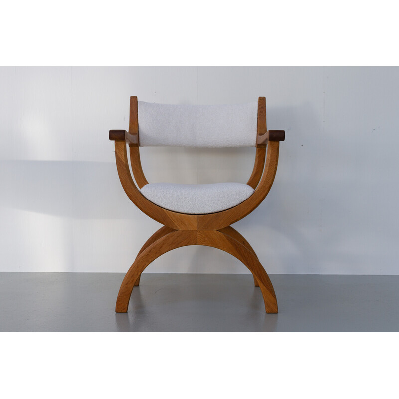 Vintage Danish Kurul armchair in oakwood and bouclé by Henning Kjærnulf, 1960s