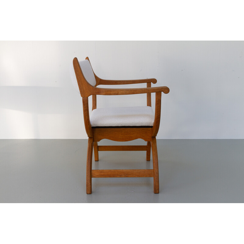 Vintage Danish Kurul armchair in oakwood and bouclé by Henning Kjærnulf, 1960s