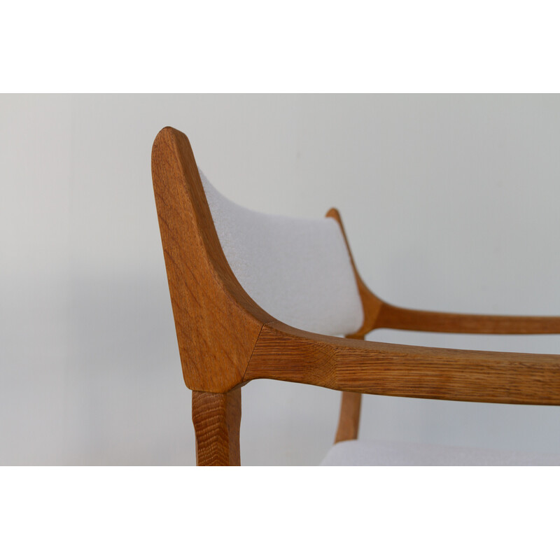 Vintage Danish Kurul armchair in oakwood and bouclé by Henning Kjærnulf, 1960s