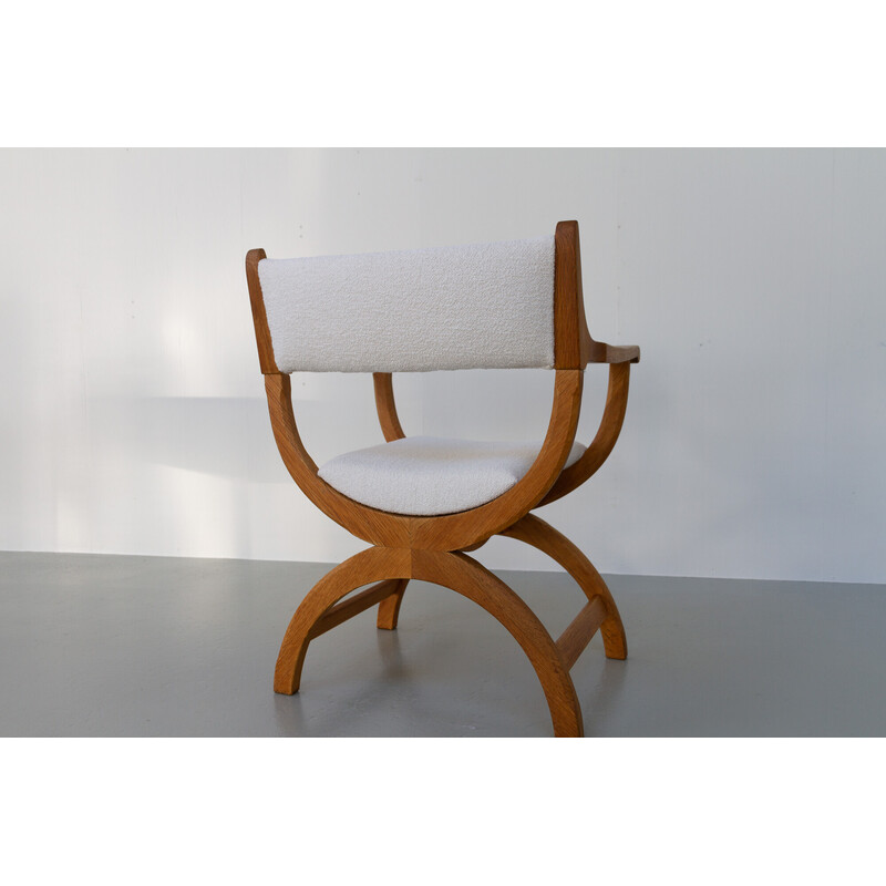 Vintage Danish Kurul armchair in oakwood and bouclé by Henning Kjærnulf, 1960s