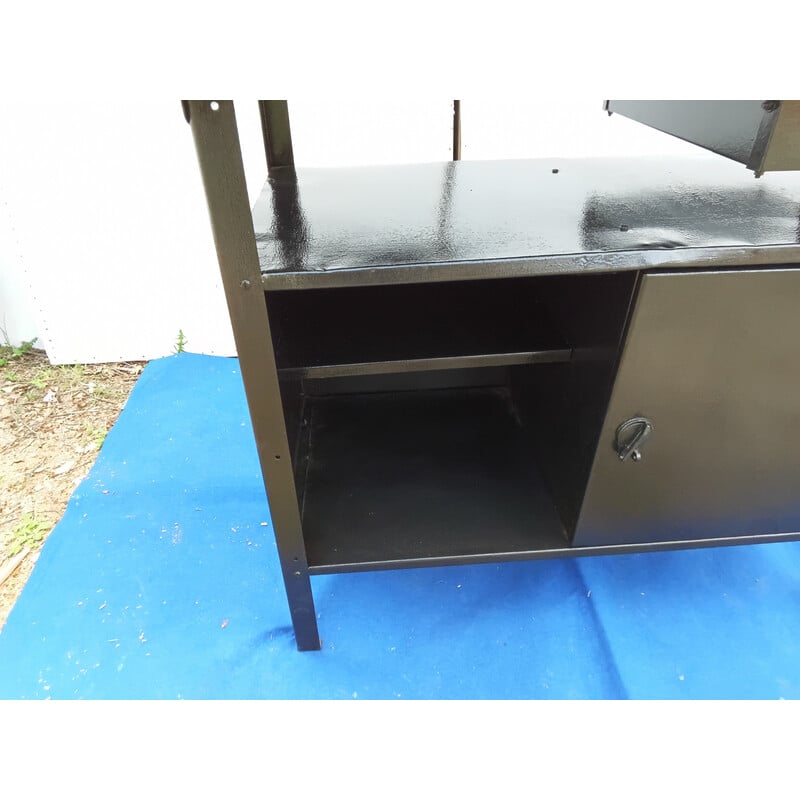 Vintage black metal workbench with white wood top
