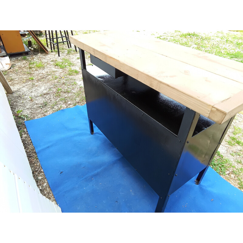 Vintage black metal workbench with white wood top