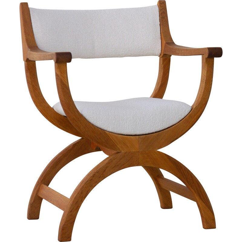 Vintage Danish Kurul armchair in oakwood and bouclé by Henning Kjærnulf, 1960s