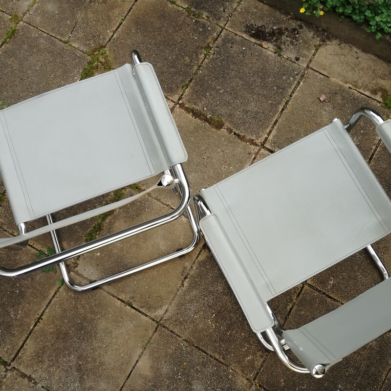 Pair of vintage cantilever armchairs in grey leather, Italy 1980