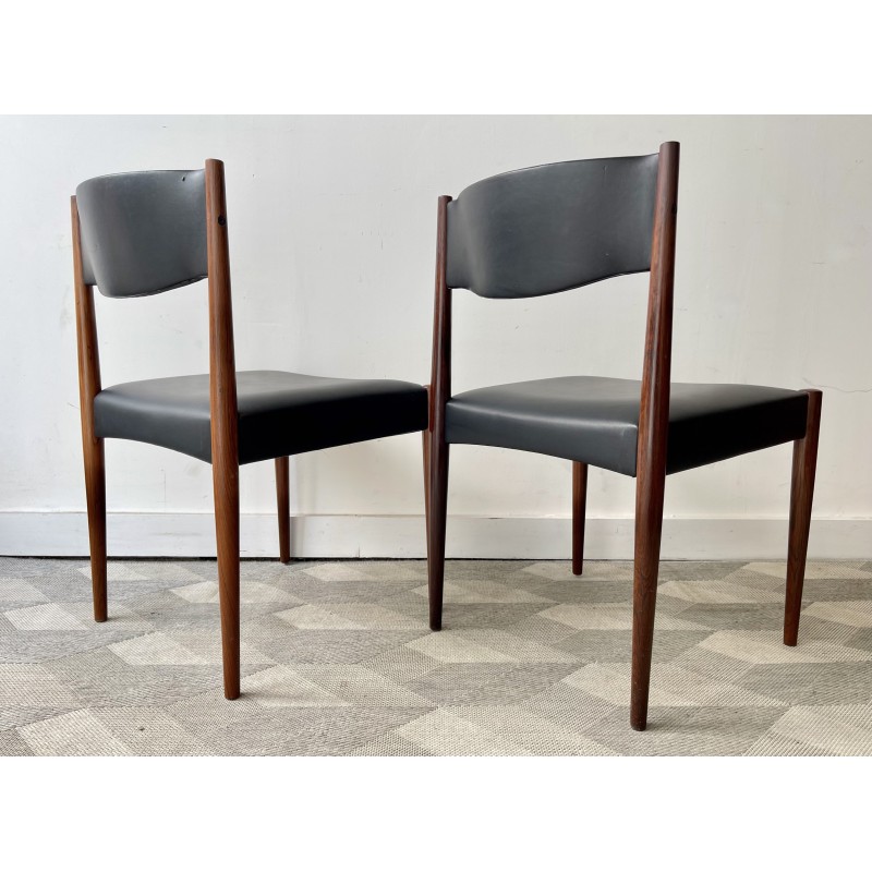 Vintage rosewood chairs with black vinyl