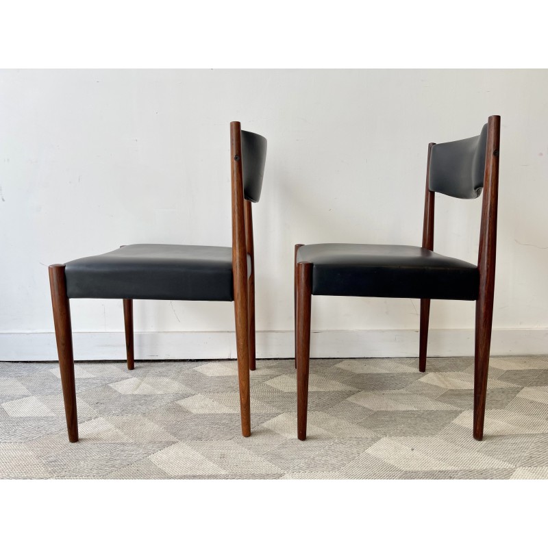 Vintage rosewood chairs with black vinyl