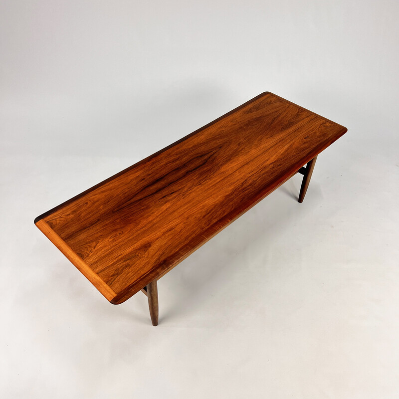 Mid century rozenhout en lederen salontafel van Topform, 1960