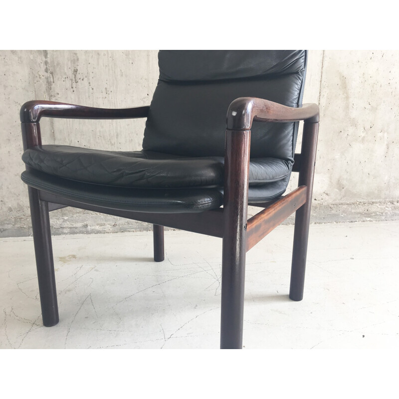 Mid century Danish leather armchair with lacquered rosewood frame produced by Dyrlund - 1970s