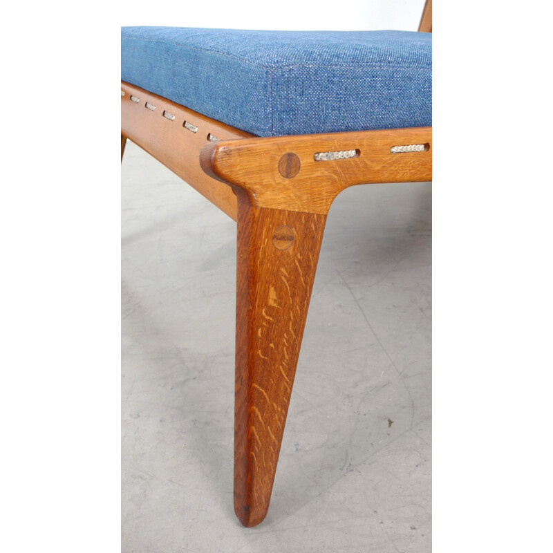 Blue low chair in wool and oak with its ottoman - 1950s