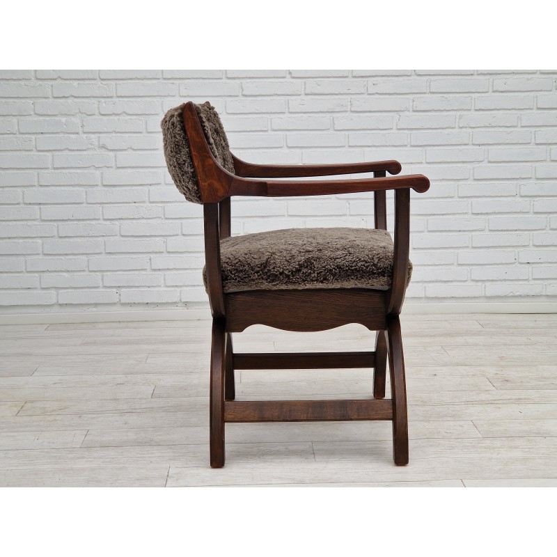 Fauteuil vintage "Kurul" en peau de mouton par Henning Kjærnulf, Danemark 1960