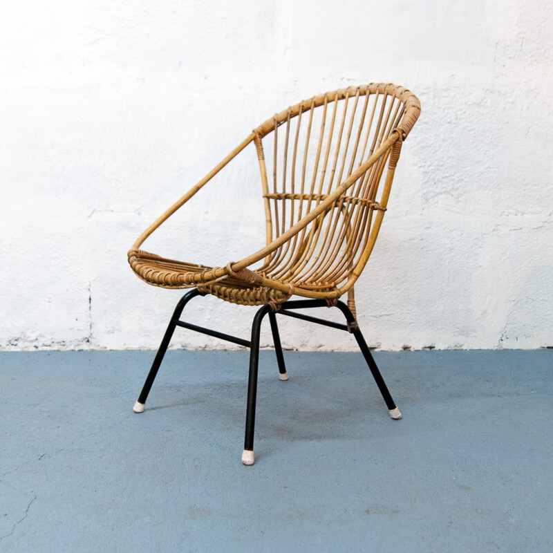 Vintage black ovoid rattan and metal armchair - 1960s