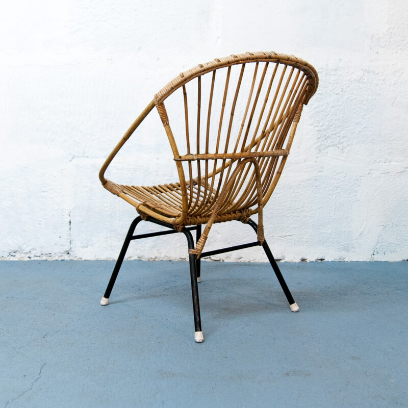 Vintage black ovoid rattan and metal armchair - 1960s