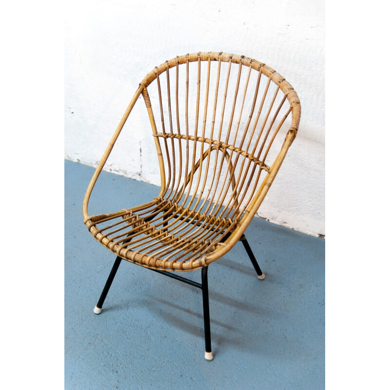 Vintage black ovoid rattan and metal armchair - 1960s