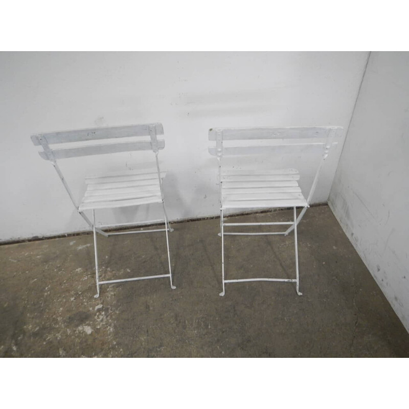Pair of vintage iron and wood folding chairs, France