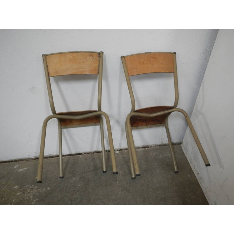 Pair of vintage iron school chairs by Mullca