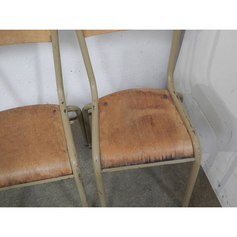 Pair of vintage iron school chairs by Mullca