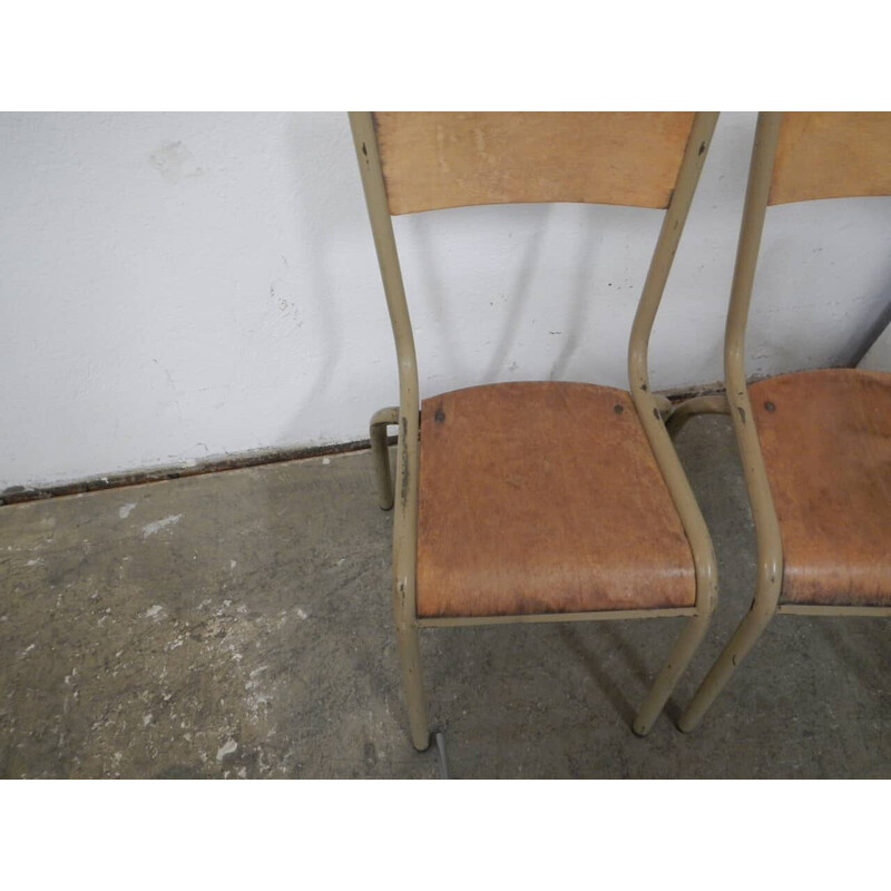 Pair of vintage iron school chairs by Mullca