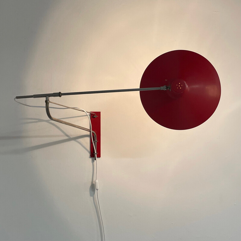 Vintage red wall lamp with swivel arm by Artimeta, 1950s