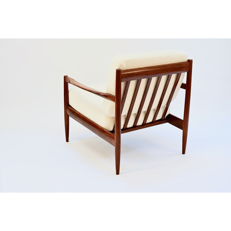 Vintage armchair in rosewood and foam