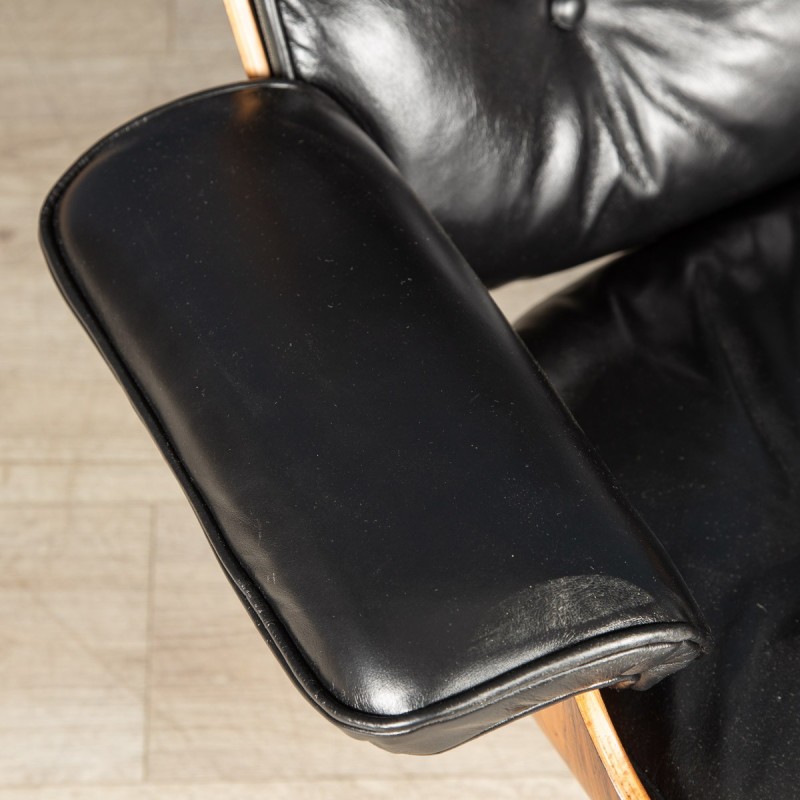 Vintage Eames black leather armchair by Mobilier International, 1980