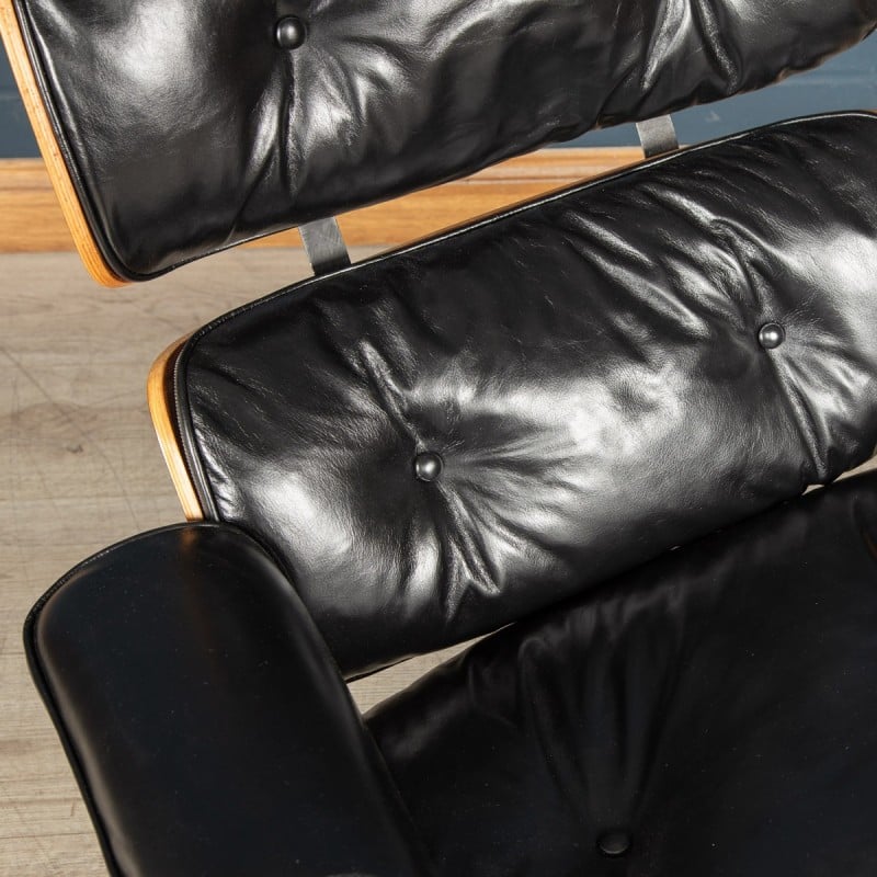 Vintage Eames black leather armchair by Mobilier International, 1980