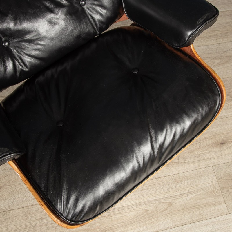 Vintage Eames black leather armchair by Mobilier International, 1980