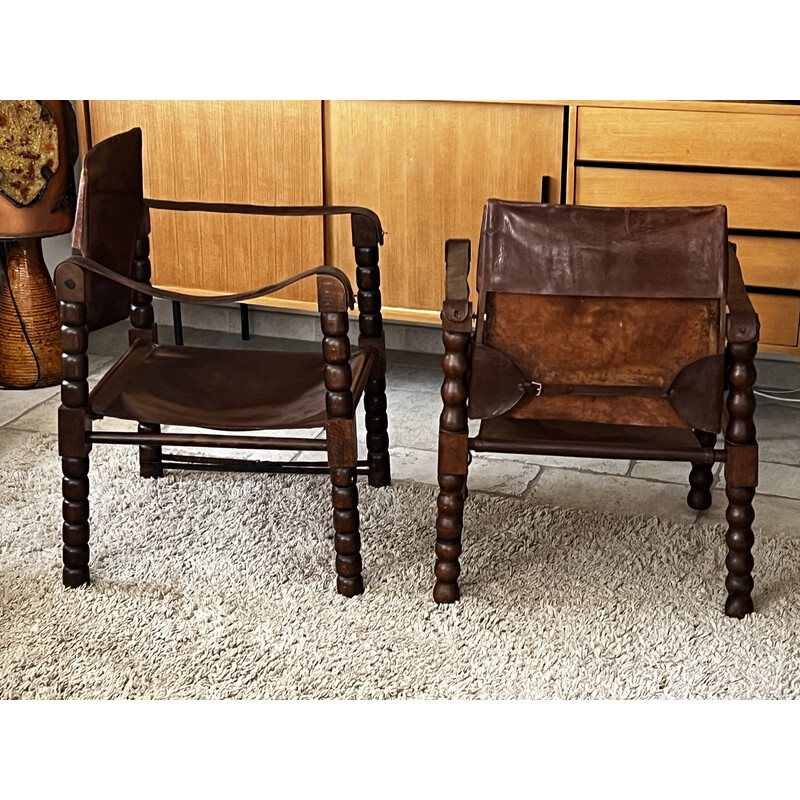 Pair of vintage safari armchairs in wood and leather, 1950